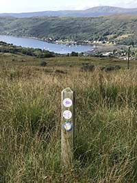 Glen Fruin to Loch Long. Overlooking Garelochhead. Route signs to follow.